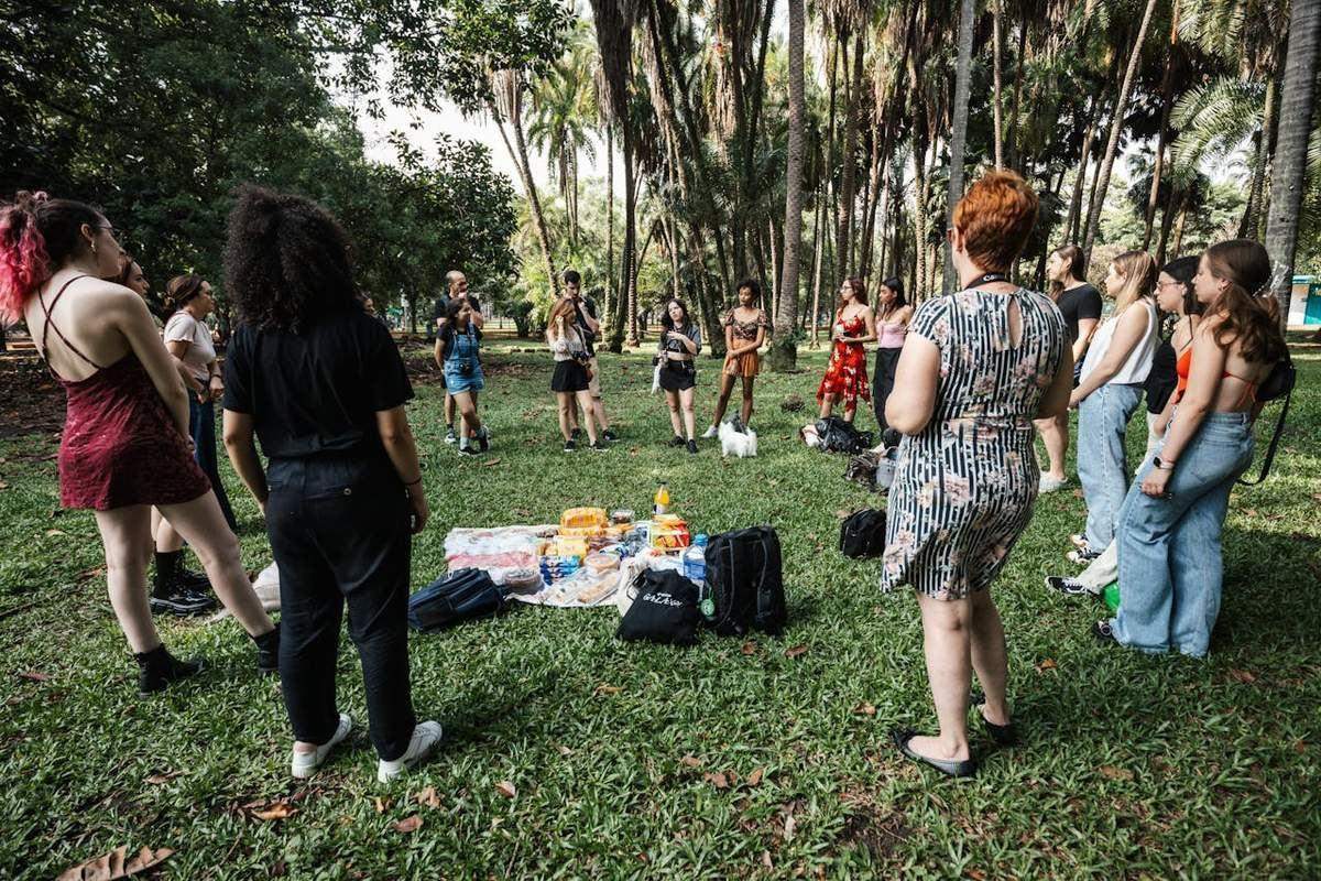 Residents gathered at a community social event in a Jamaican gated community common area