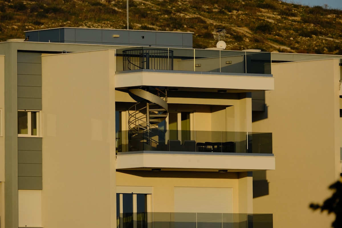 Modern condominium building in Jamaica with security infrastructure